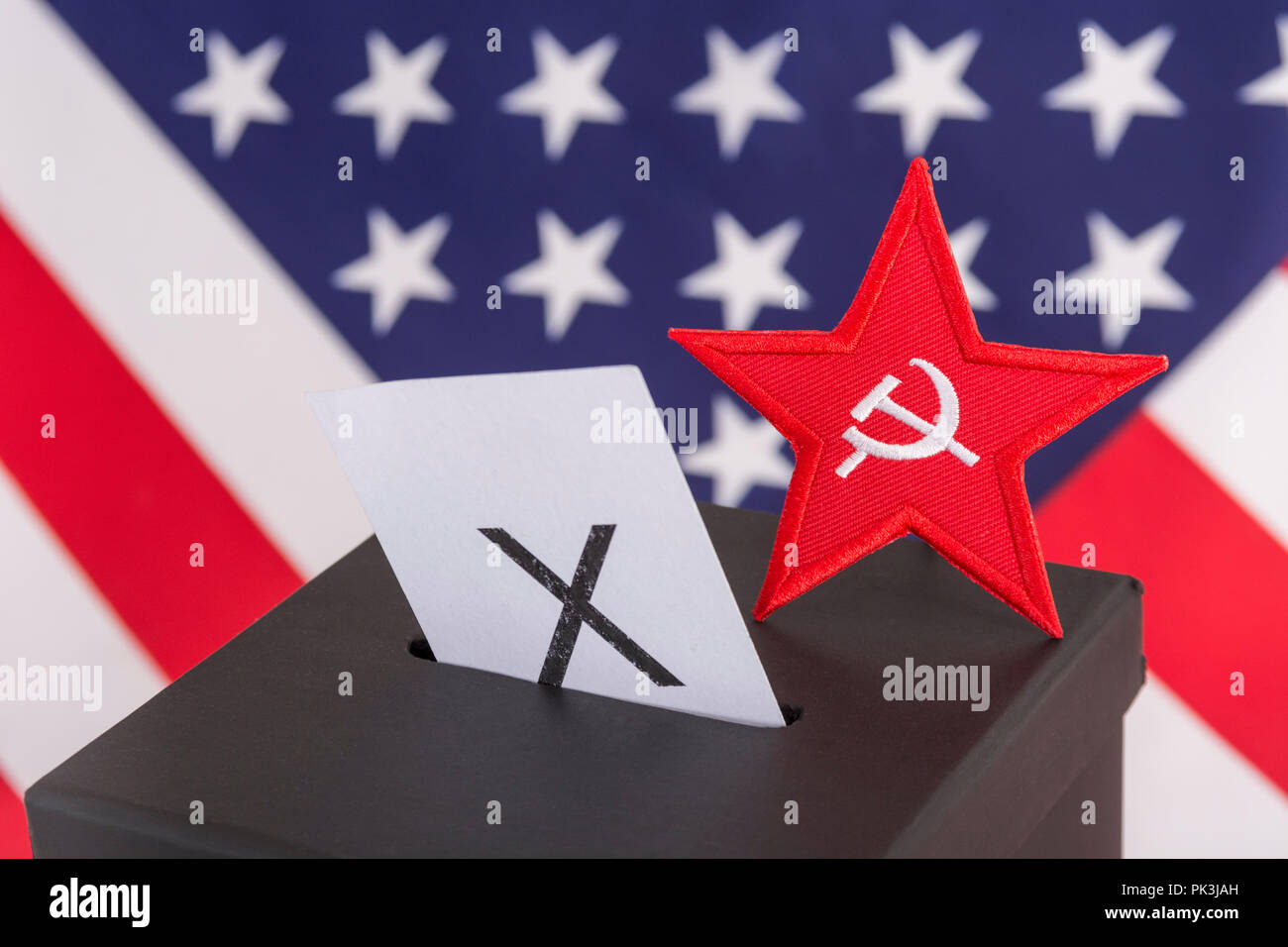 US Presidential Election / Midterm elections 2022. Red Star / Socialists logo (patch) & ballot box. US Radical Left, American marxism & communism. Stock Photo