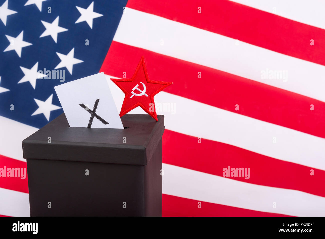 2020 US Presidential Election / Midterm elections America 2018. Red Star /Socialists logo (patch) & ballot box. US Radical Left, American communism. Stock Photo