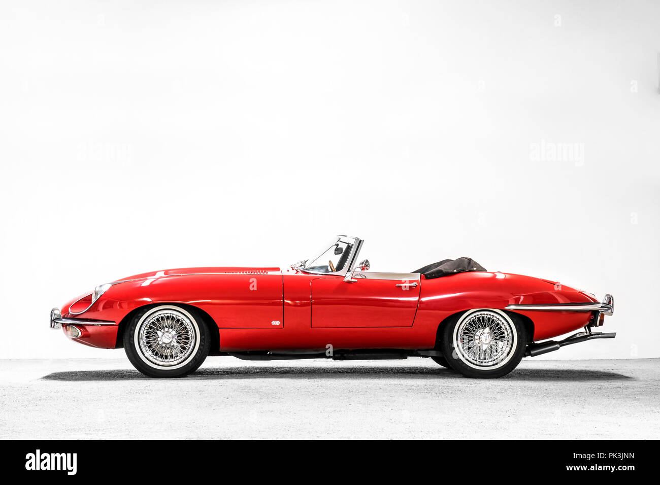 Colourful Jaguar E-Type, classic car Stock Photo - Alamy
