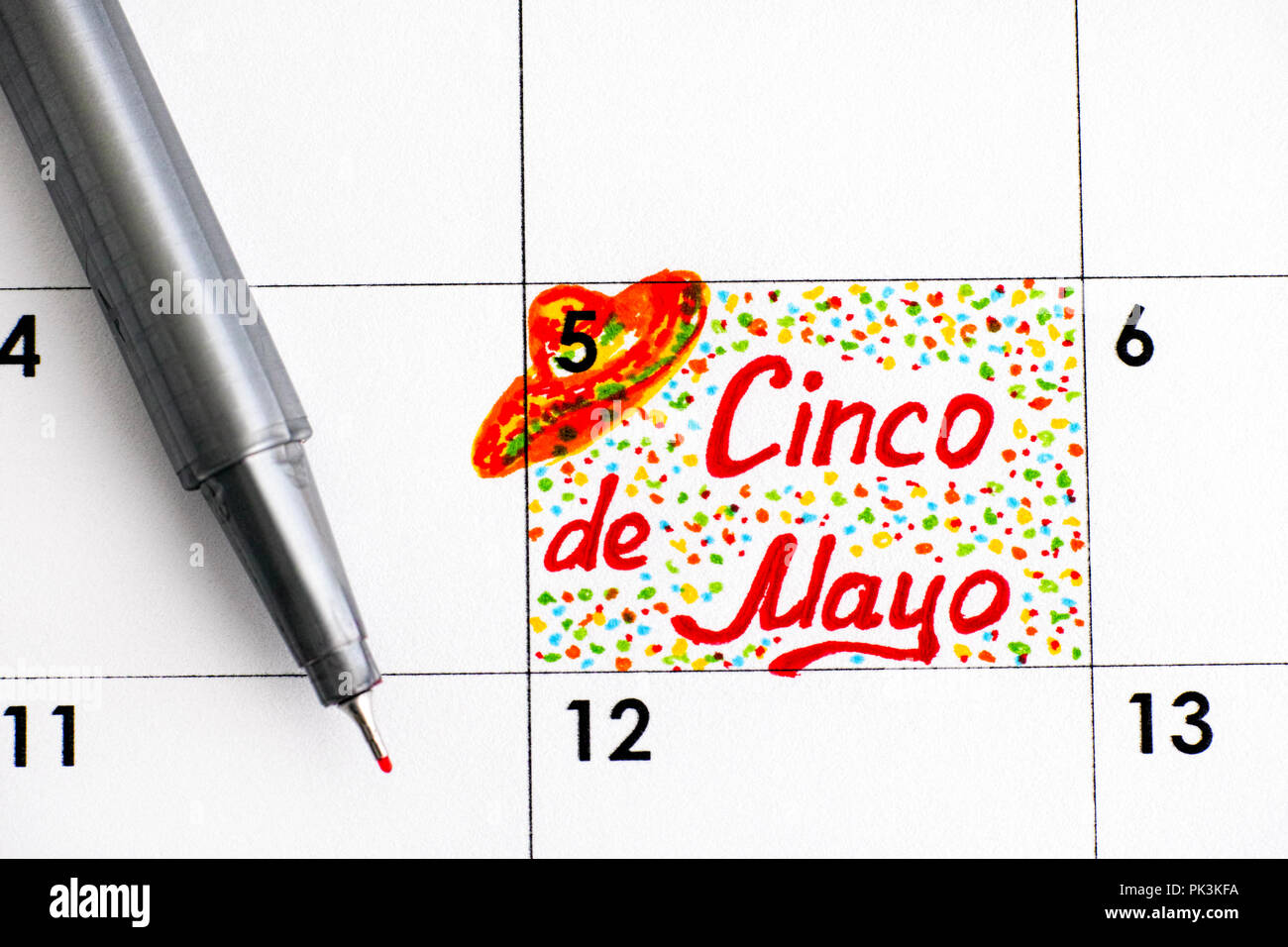 Reminder Cinco de Mayo in calendar with pen. Close-up Stock Photo - Alamy Reminder Cinco de Mayo in calendar with pen. Close-up Stock Photo - Alamy