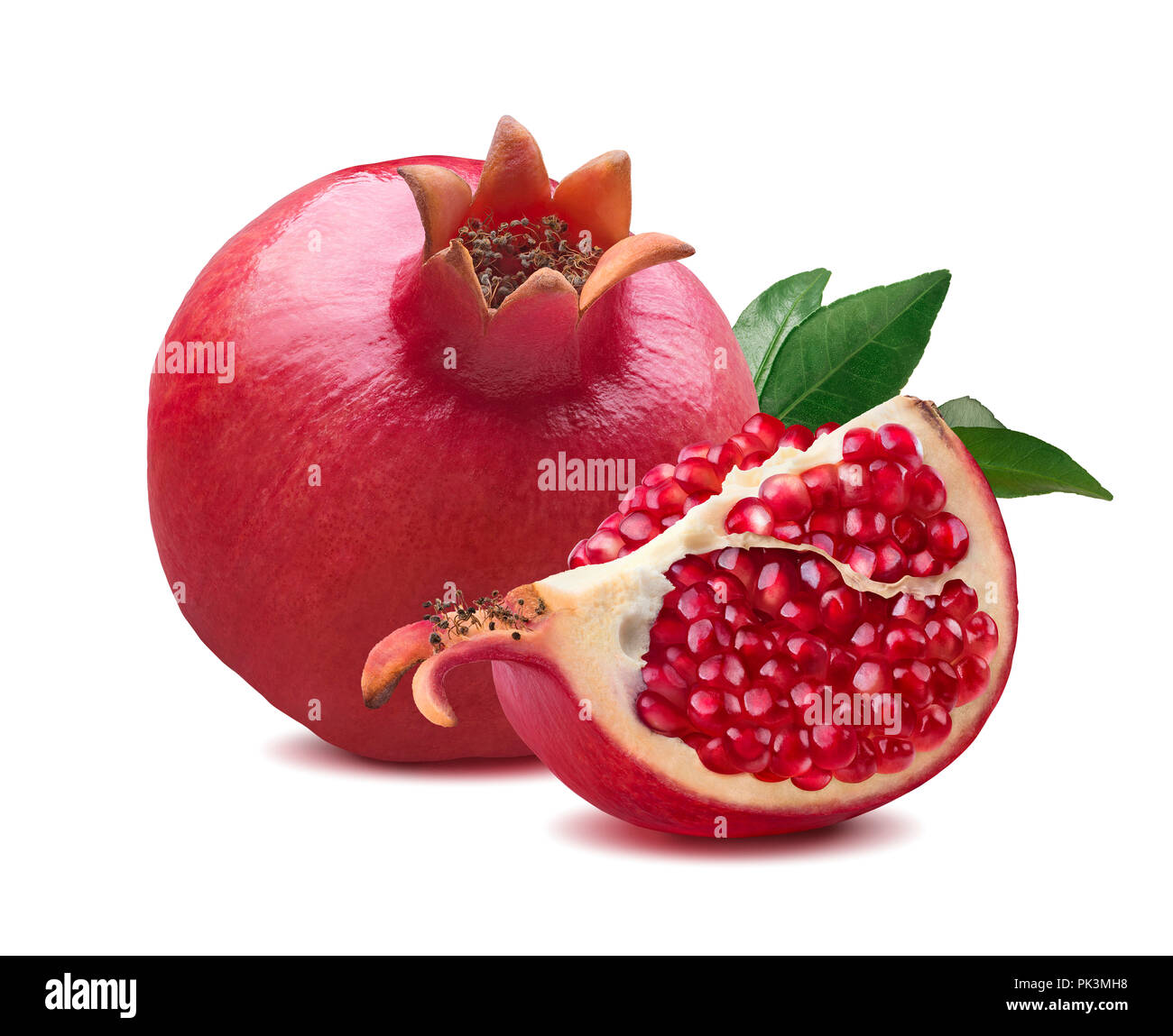 Whole pomegranate quarter piece composition isolated on white