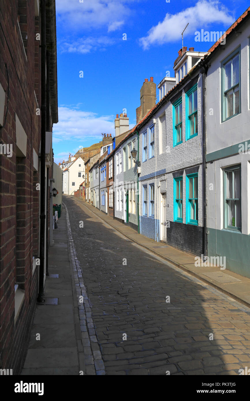Holiday cottages on cobbled Henrietta Street, Whitby, North Yorkshire
