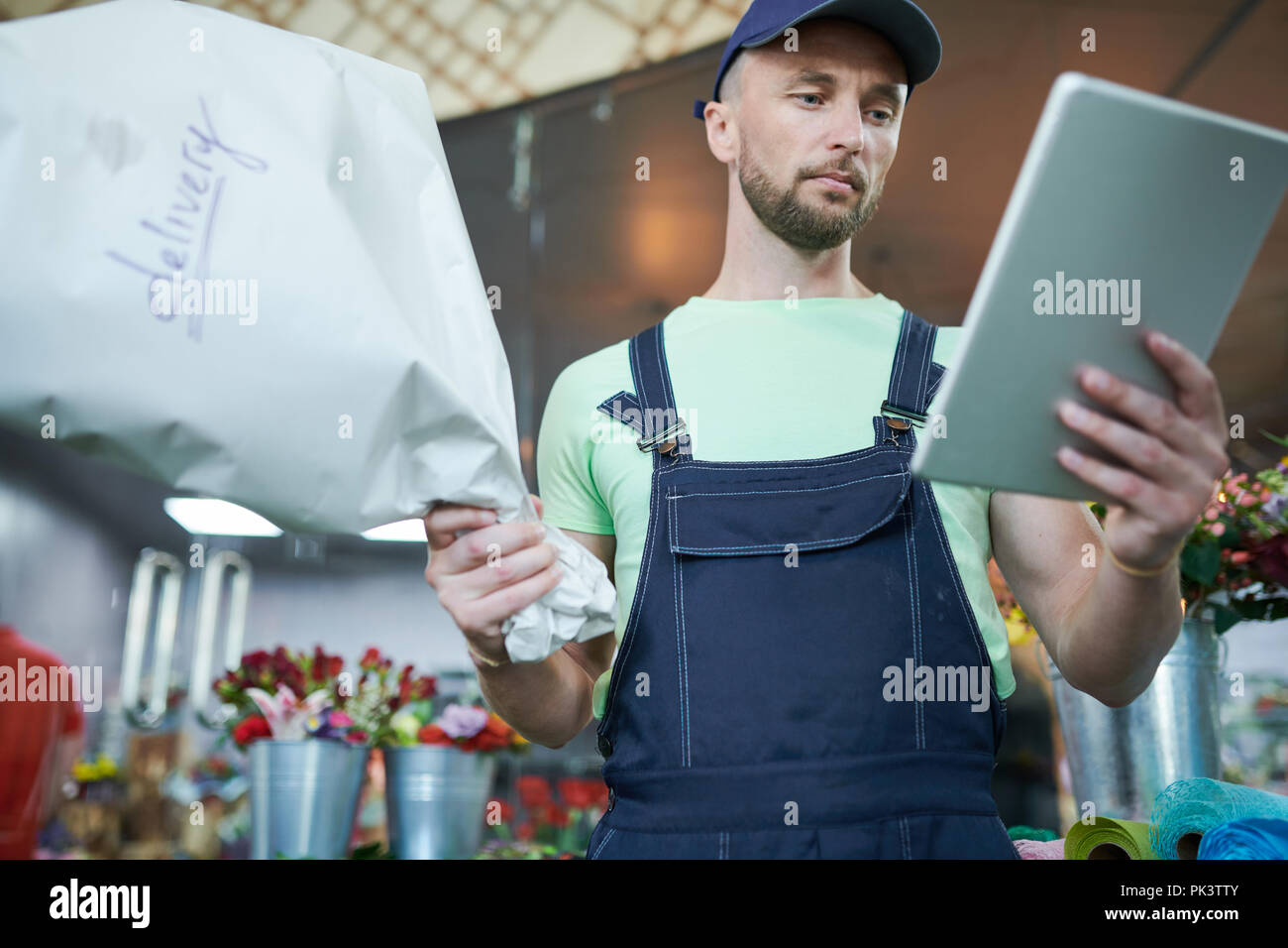 Man Delivering Flowers Stock Photo Alamy