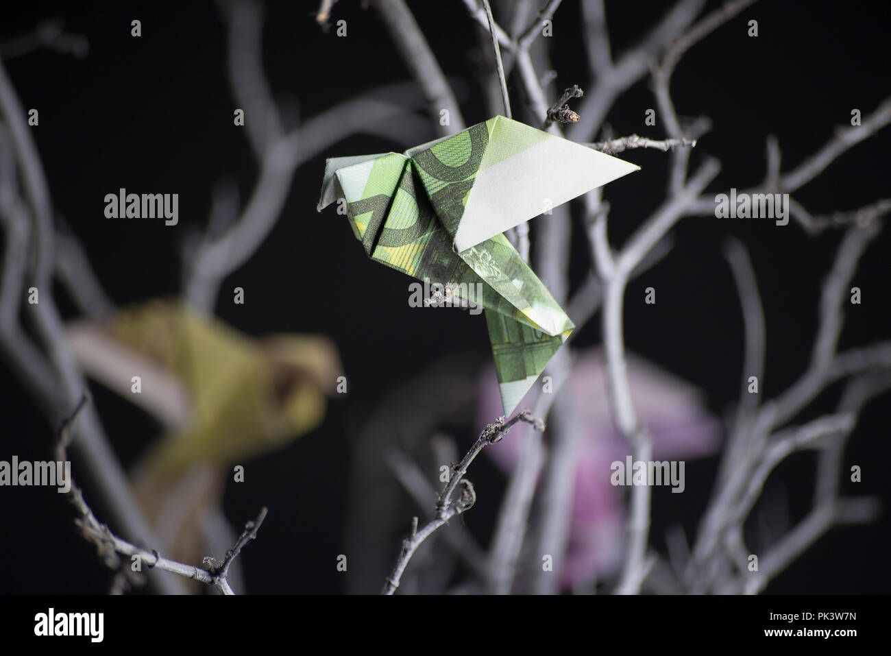 origami bird from banknotes Stock Photo - Alamy