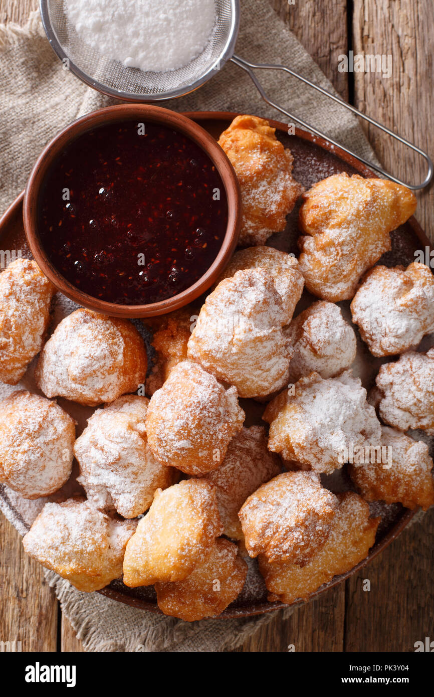 Albanian recipe for fried dough petulla with raspberry jam and powdered