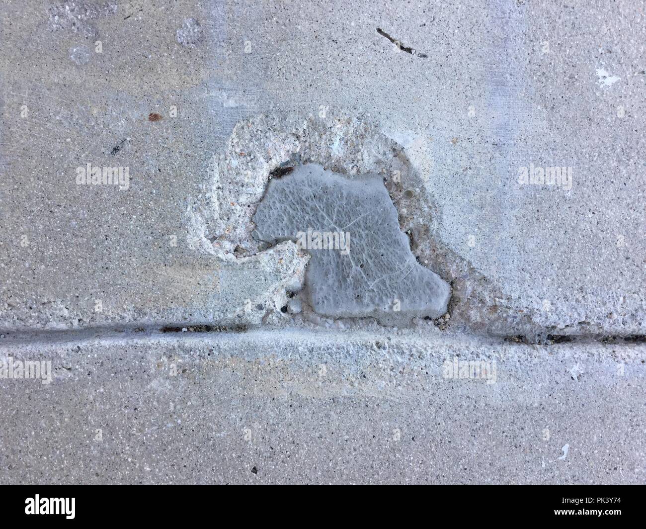 Sidewalk with line and chip Stock Photo - Alamy