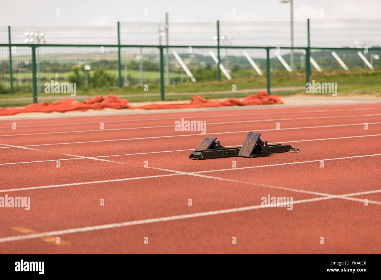 Starting blocks on running track Stock Photo Alamy