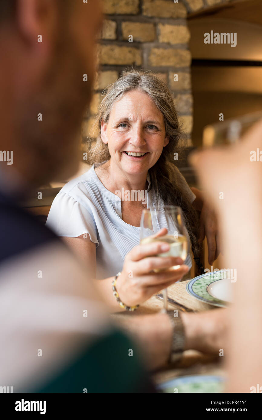 Senior couple interacting with each other on dining table Stock Photo