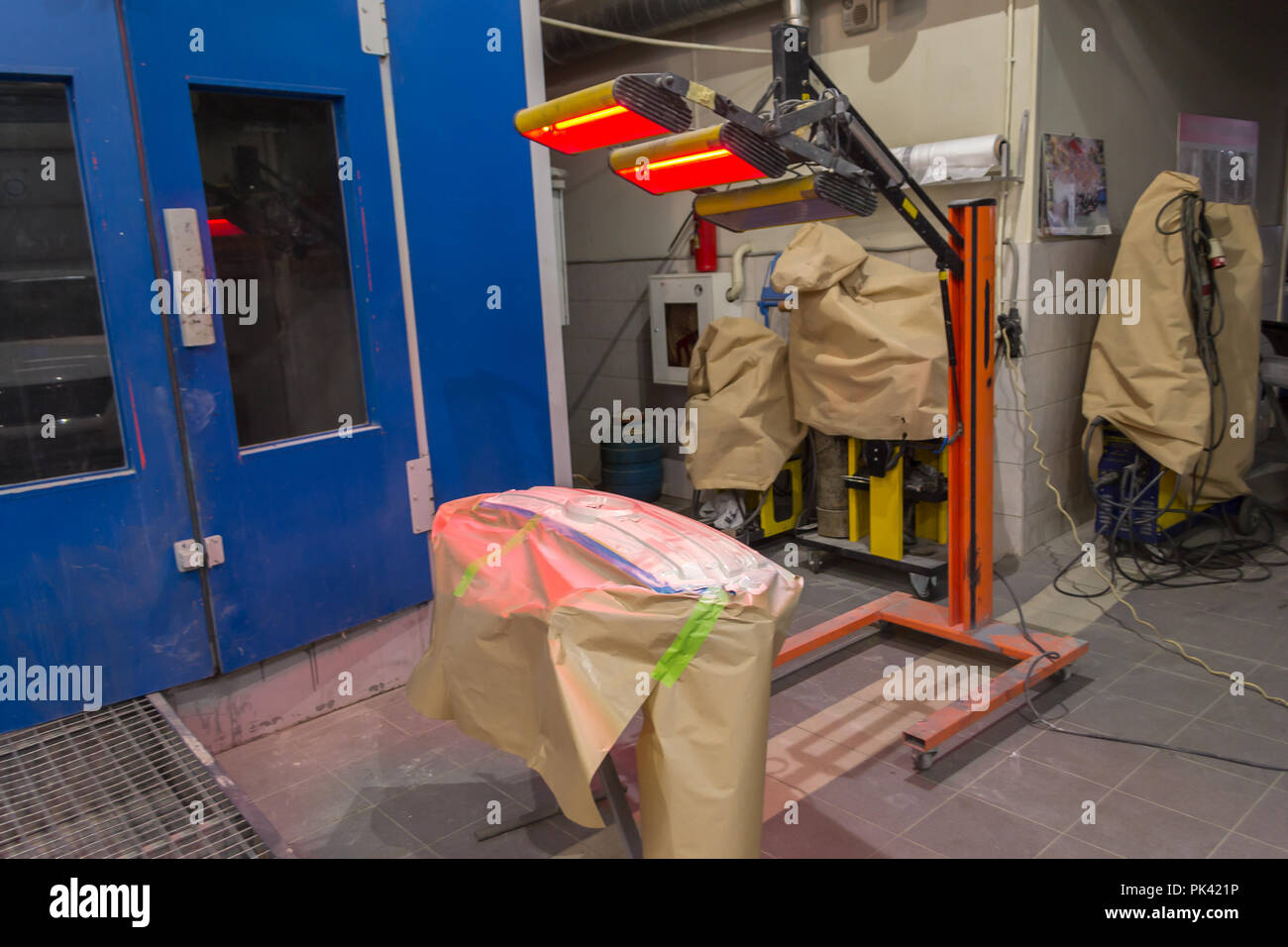 Infrared drying of car body parts such as radiator grille after