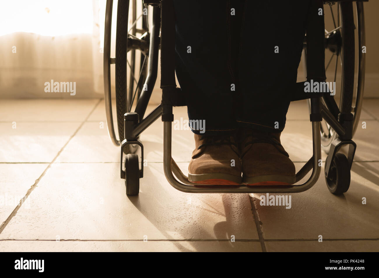 Disabled man in wheelchair hi-res stock photography and images - Alamy