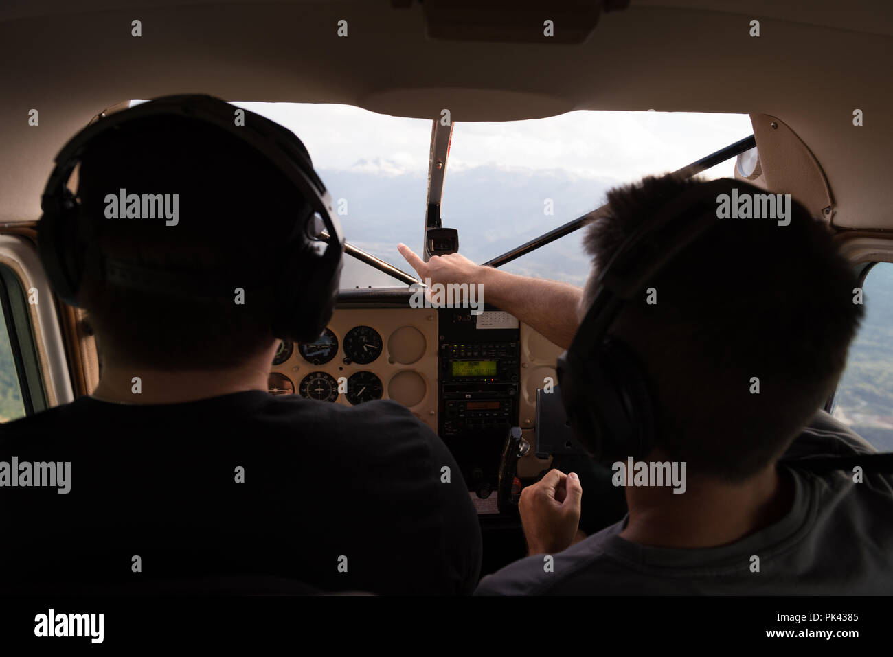 Pilots talking to each other while flying Stock Photo