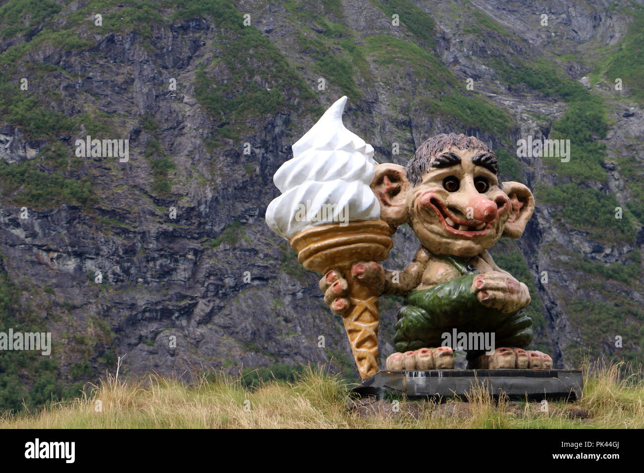 Troll statue along the way when you are driving to the famous national park trollstigen, a road to very high mountains , very touristic Stock Photo