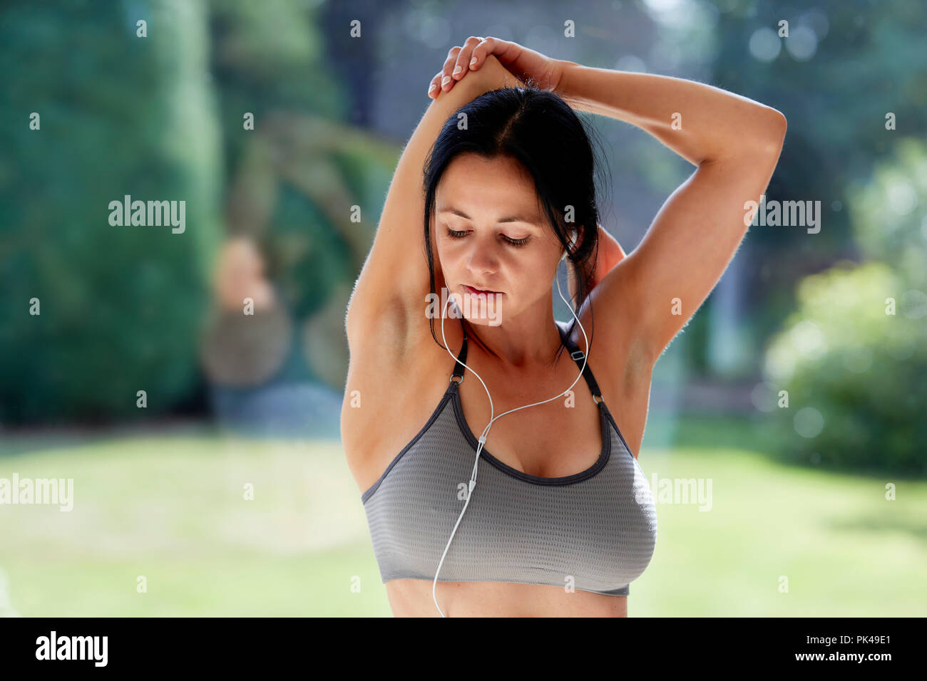 Girl cooling down after exercising Stock Photo