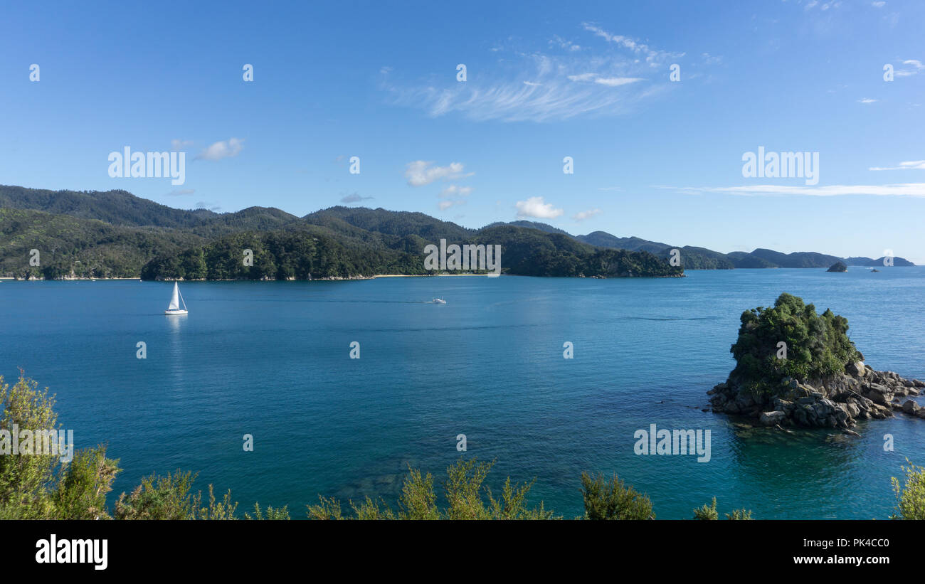 Abel Tasman Costal Track - South Pacific Pristine Blue Sea With Clear Blue Sky Stock Photo
