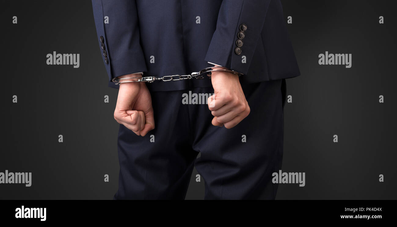 Man getting arrested suit hi-res stock photography and images - Alamy