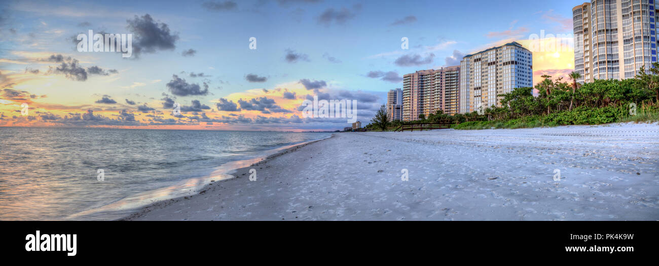 Sunset over the ocean at Vanderbilt Beach in Naples, Florida Stock