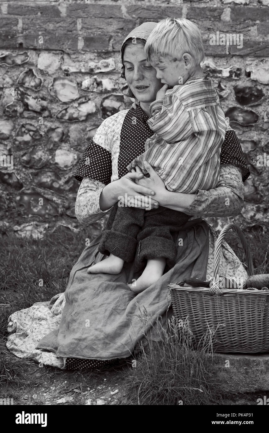 Victorian Working Class - the 'great unwashed'. Victorian woman & urchin child Stock Photo