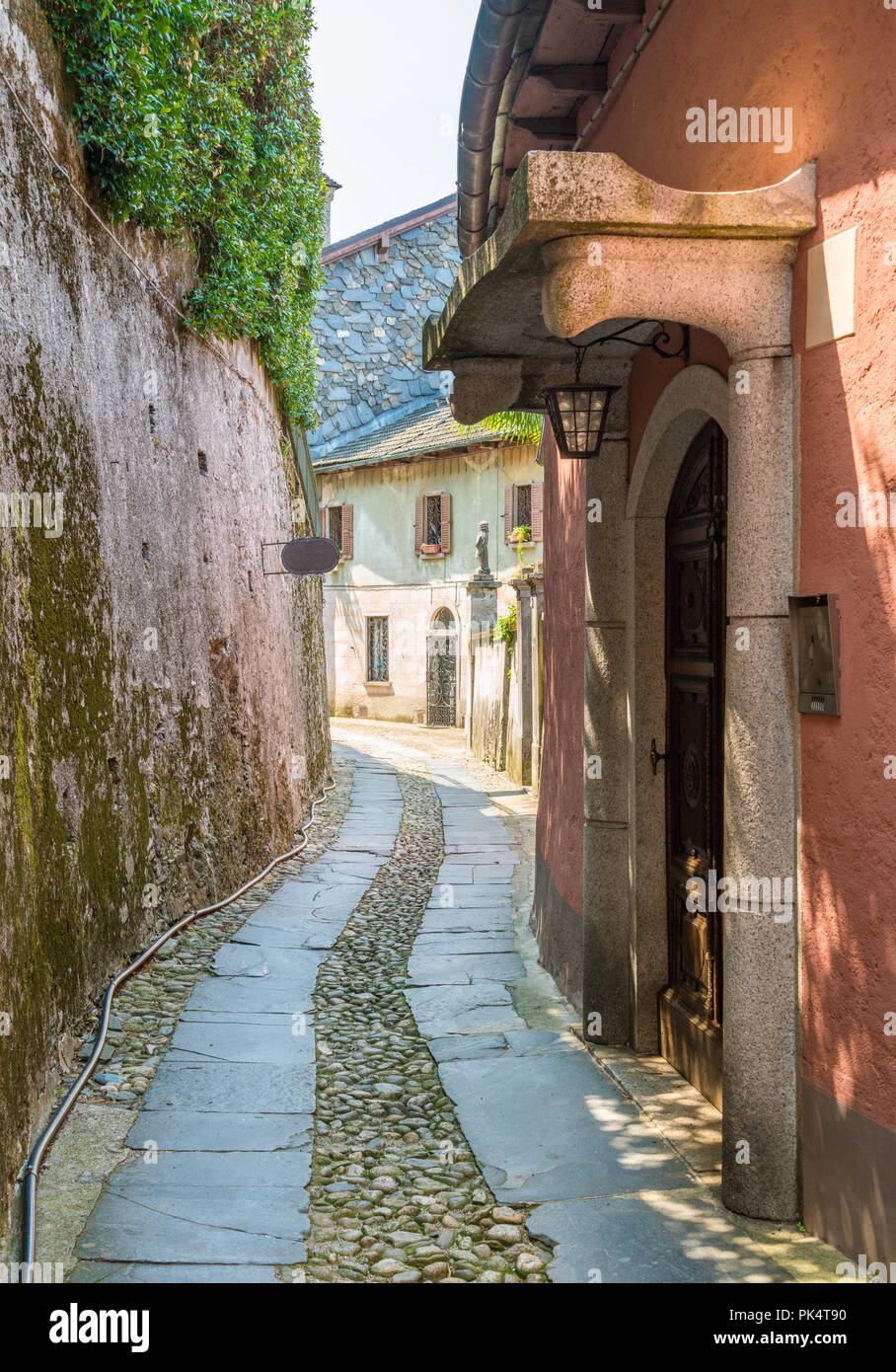 Scenic sight in the beautiful San Giulio Island in the Lake Orta, Piedmont, Italy. Stock Photo