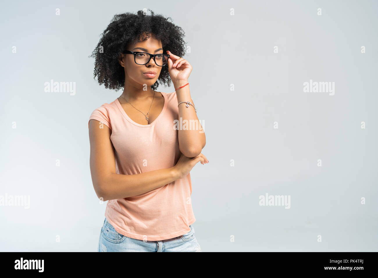 Portrait of beautiful smiling black woman in glasses Stock Photo - Alamy