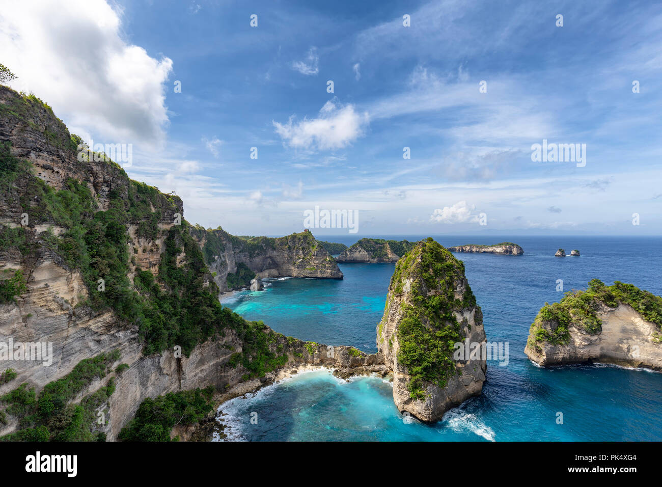 View of the small island of Nusa Batumategan and Nusa Batupadasan Island from the Raja Lima shrine on Nusa Penida Island near Bali, Indonesia. Stock Photo