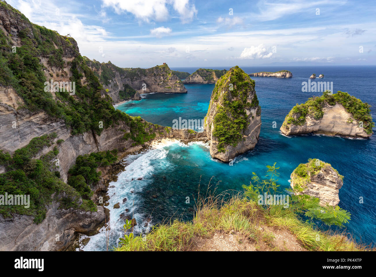 Interesting view of a collection of small islands near the Atuh Raja Lima shrine on Nusa Penida, Indonesia. Stock Photo