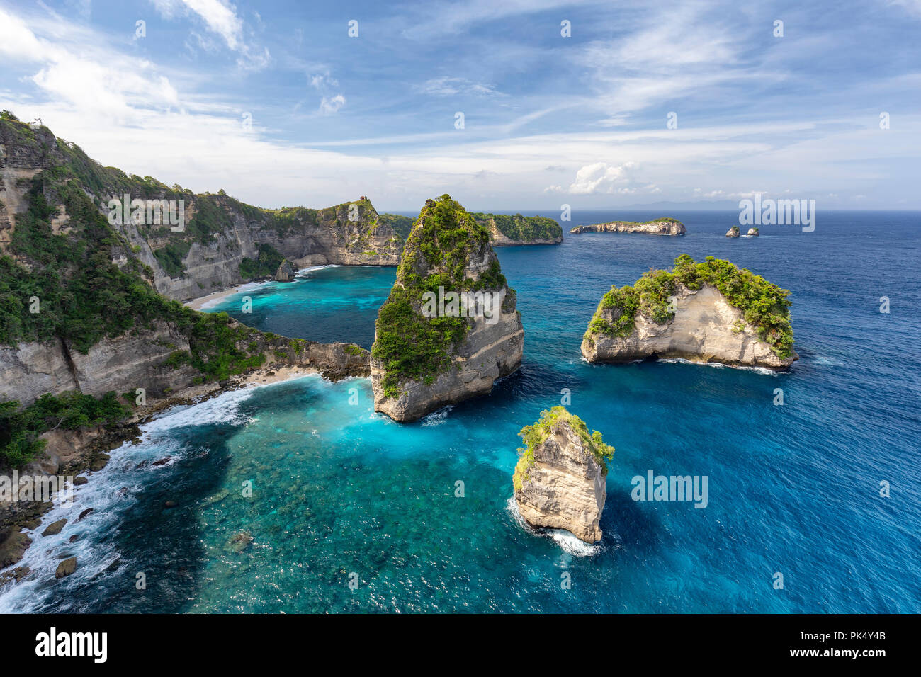 Small islands off of Nusa Penida known as Raja Lima or the five kings in Indonesia. Stock Photo