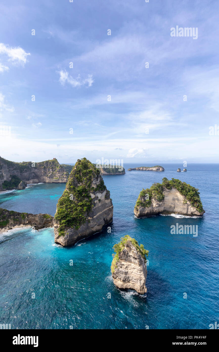 Raja Lima or Five Kings, islands off the coast of Nusa Penida near Atuh Beach. Stock Photo