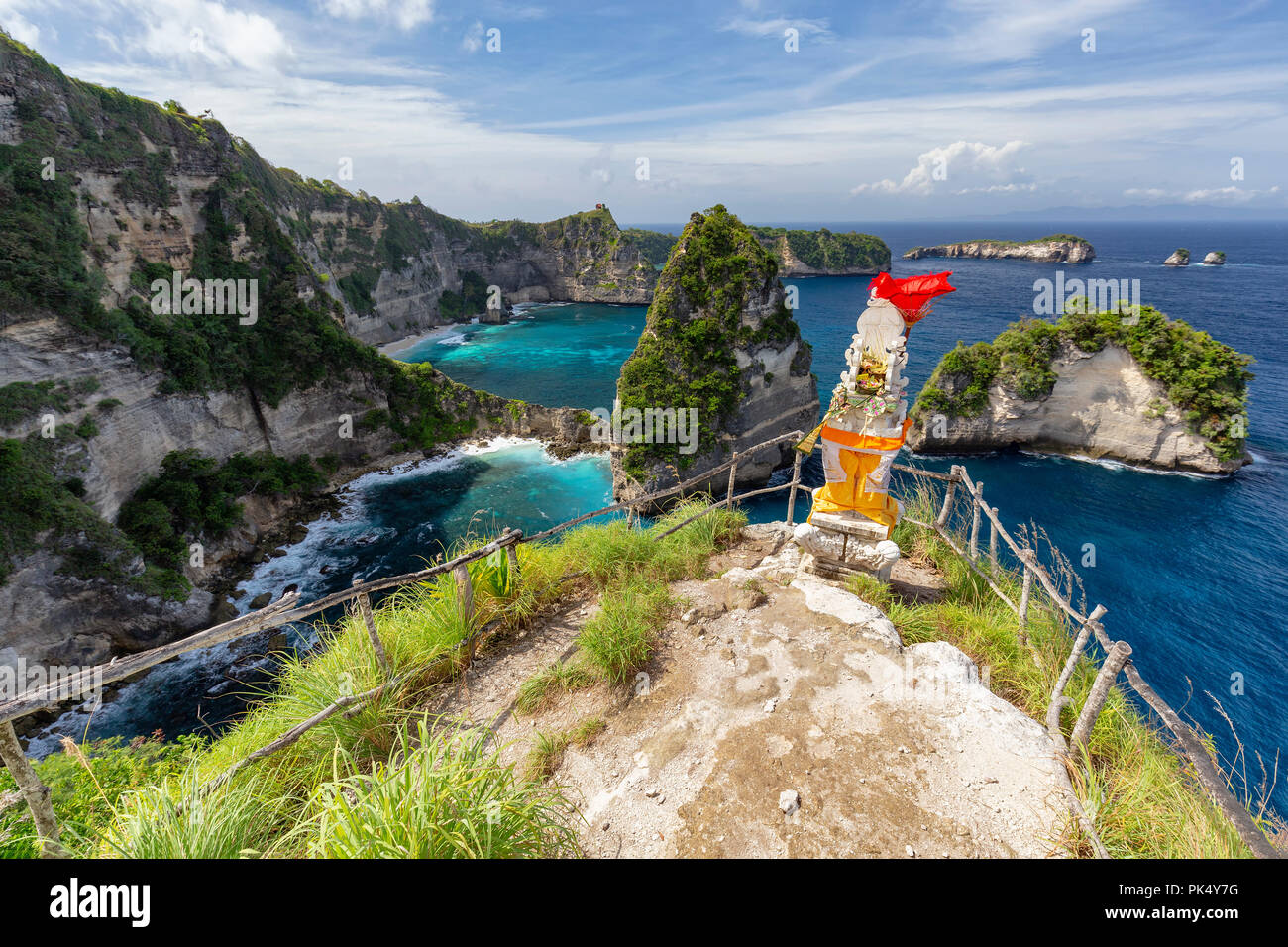 Five Kings or Raja Lima and a small shrine on Nusa Penida in Indonesia. Stock Photo