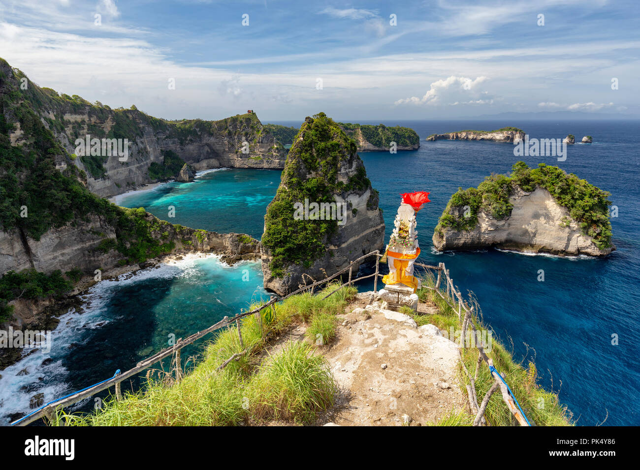Small Raja Lima islands with a beautiful shrine in the foreground on Nusa Penida in Indonesia. Stock Photo