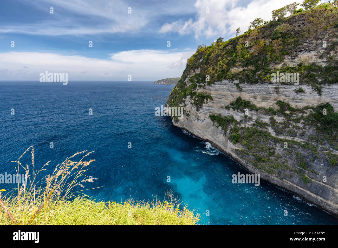 Tropical clear water above Belah Poh point on Nusa Penida near Bali. Stock Photo