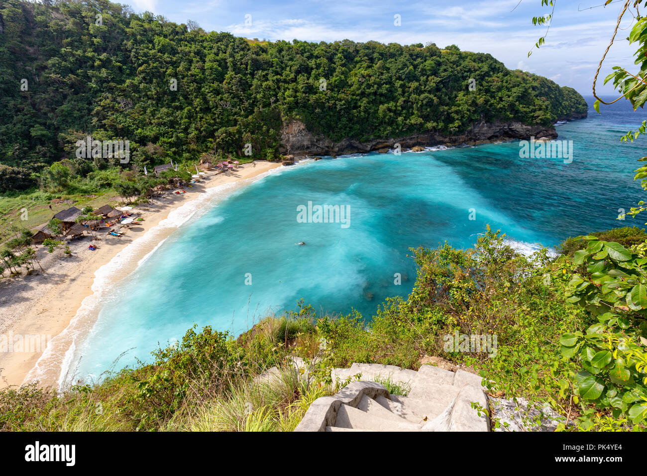 Stairs leading to beautiful Atuh Beach in Nusa Penida near Bali. Stock Photo