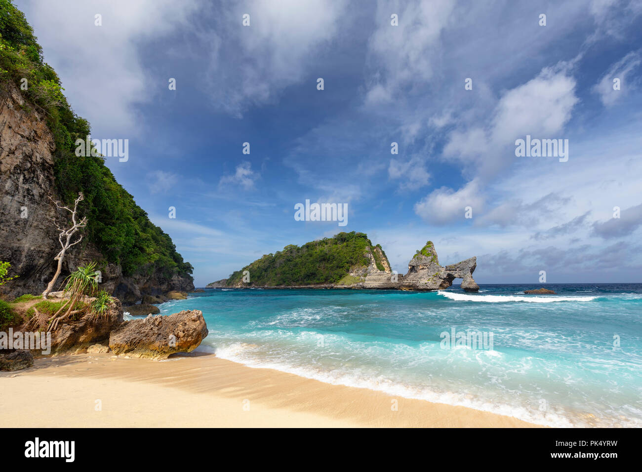 A beautiful rock formation just off the shore of Atuh beach on Nusa Penida near Bali. Stock Photo