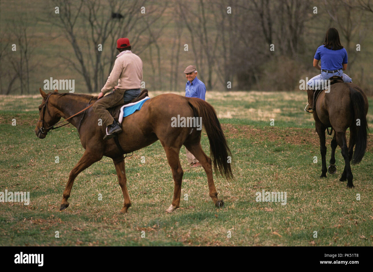 Bay Cockburn(on right)talks with Dr. Joe Rodgers during a workout in 1998 of steeplechase hourses at Dr, Joe Rodgers Farm in Hamilton, Virginia. Cockb Stock Photo