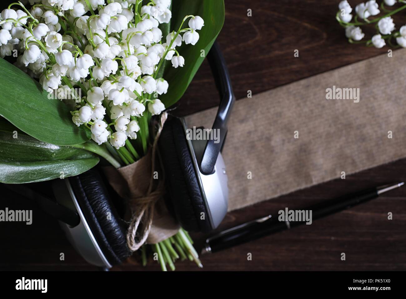 Bouquet of lilies of the valley on a table Stock Photo - Alamy