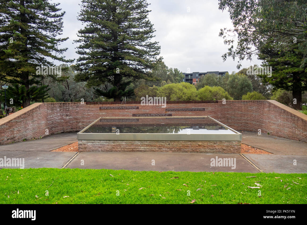 An AIDS memorial 2001 with a reflection pond, monument commemorating all who have died from AIDS, located in Robertson Park, Perth, WA Australia. Stock Photo