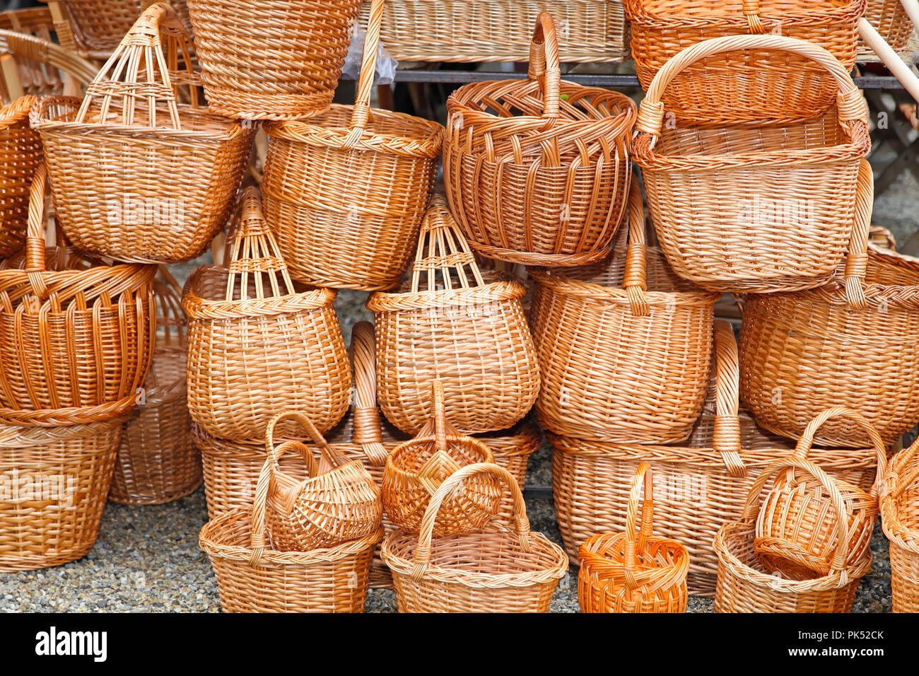 Big bunch of handcrafted woven wicker baskets Stock Photo - Alamy