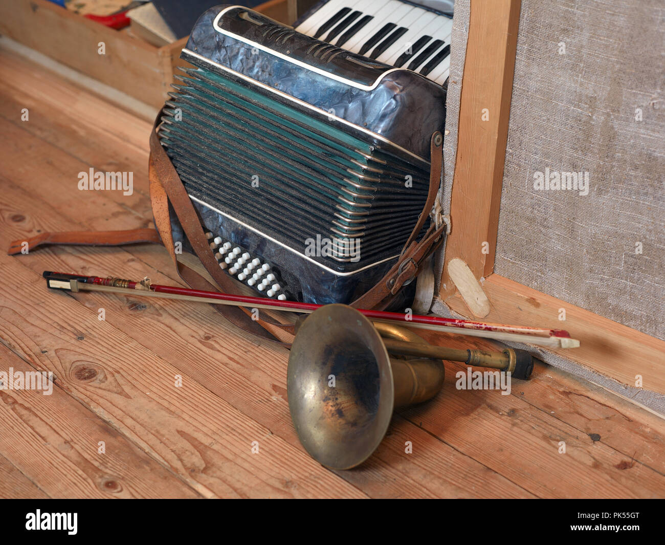 Messy Instruments A room seems messy with various musical instruments on the floor Stock ...