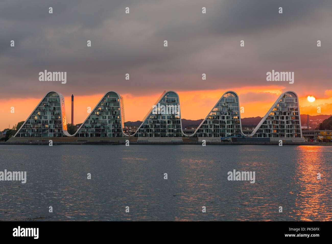 The Wave in Vejle, Denmark designed by Henning Larsen Architects is a new unique housing that embraces the sculptural and organic forms to become a ne Stock Photo