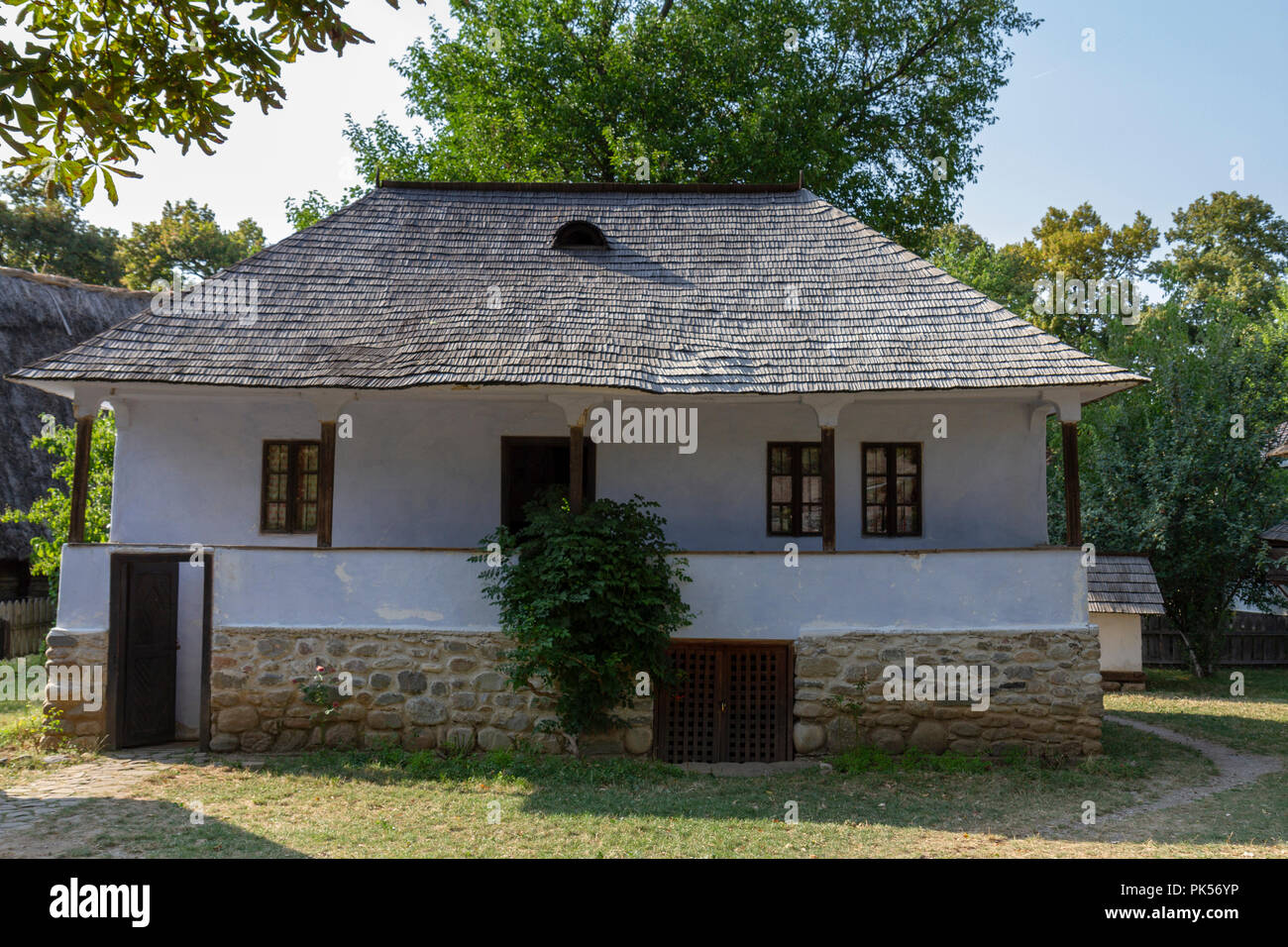 A 19th century house from Stanesti, Arges region in the Dimitrie Gusti National Village Museum in Herăstrău Park, Bucharest, Romania. Stock Photo