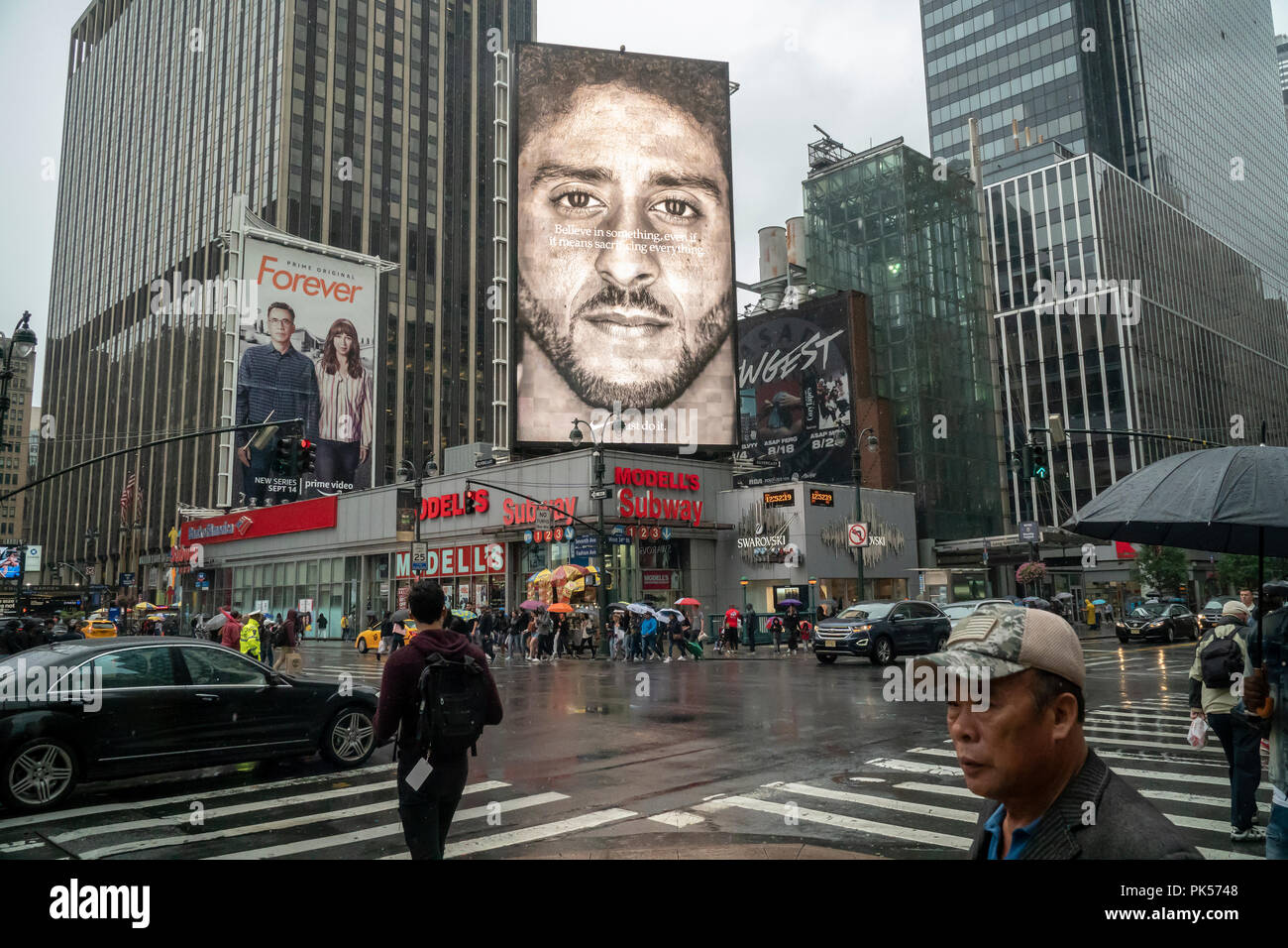 An electronic billboard for Nike products features Colin Kaepernick, the American football quarterback who in protest against police brutality 'took a knee' during the playing of the national anthem, seen on Sunday, September 9, 2018. The 'Just Do It' ad campaign, which also features other athletes, some handicapped, has elicited calls for a boycott of Nike from conservative elements as Nike saw a spike of 31% in its online sales.  (Â© Richard B. Levine) Stock Photo