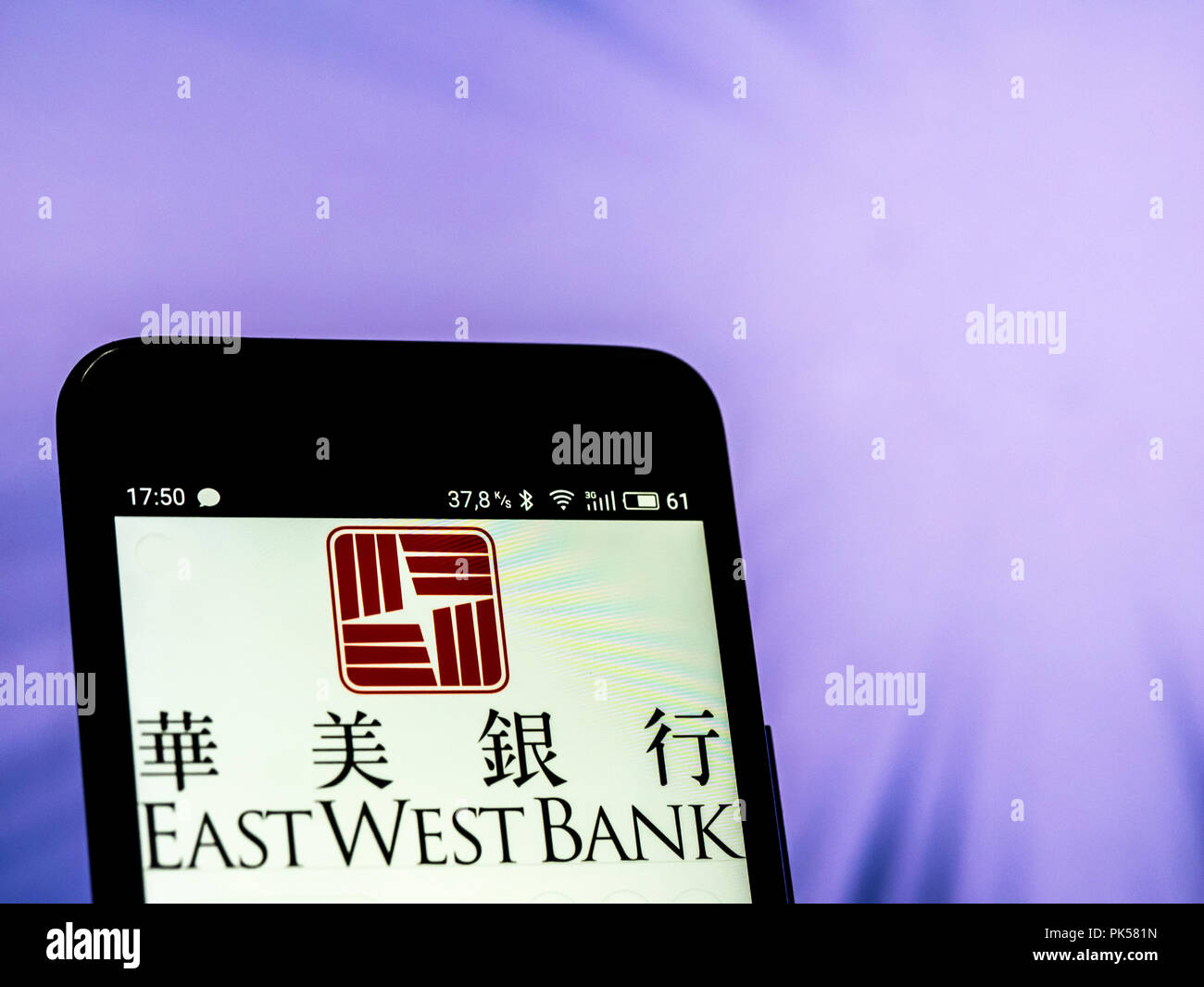 East West Bank Logo Seen Displayed On A Smart Phone Stock Photo