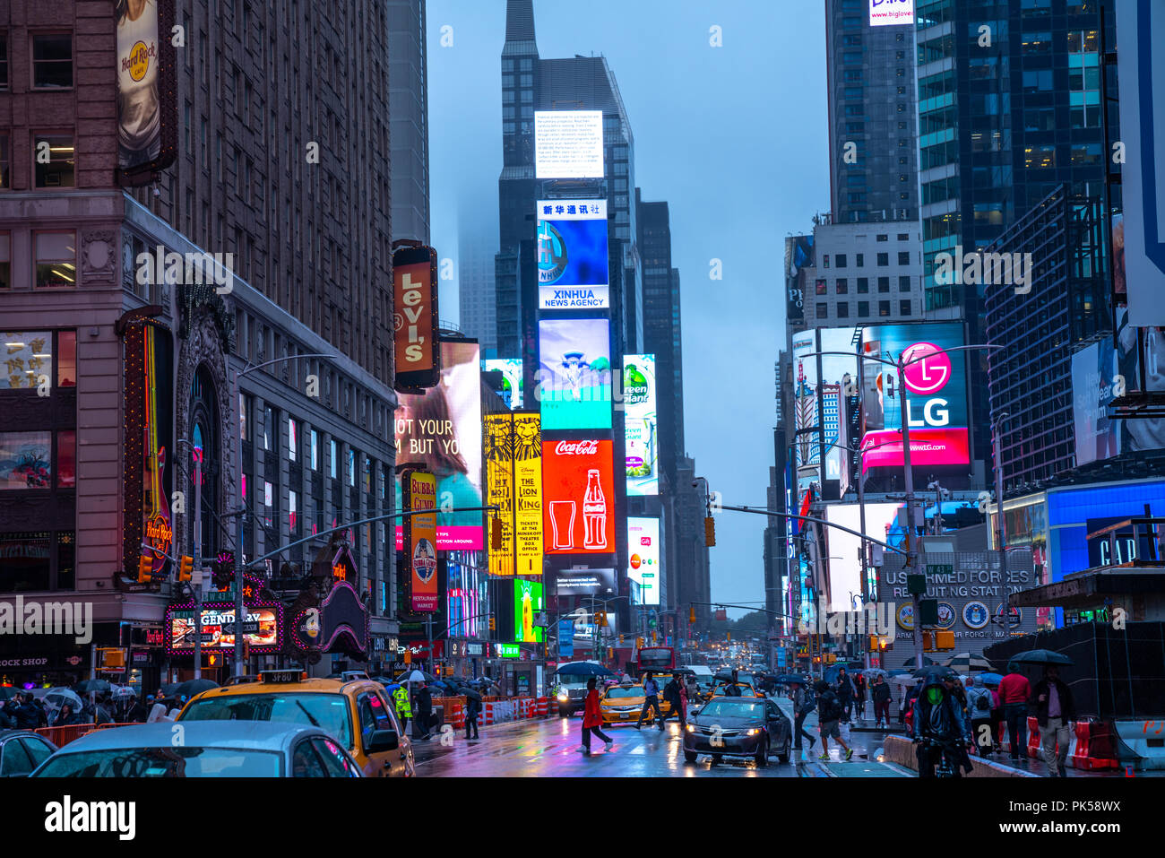 New York, USA,  10 September 2018.  New York city's Times Square on a rainy day at dusk.  Credit: Enrique Shore Stock Photo