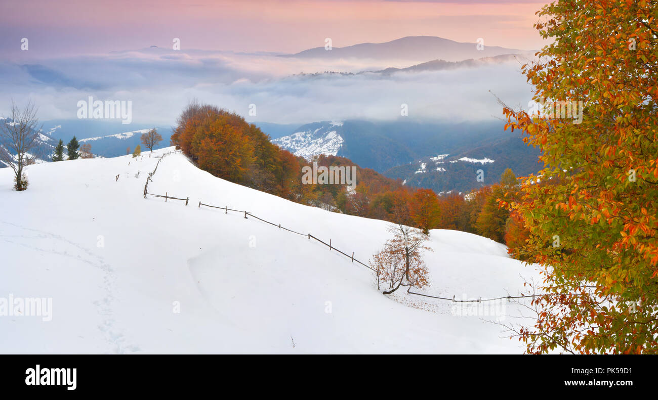 Beautiful autumn landscape with first snow in the mountains. Stock Photo