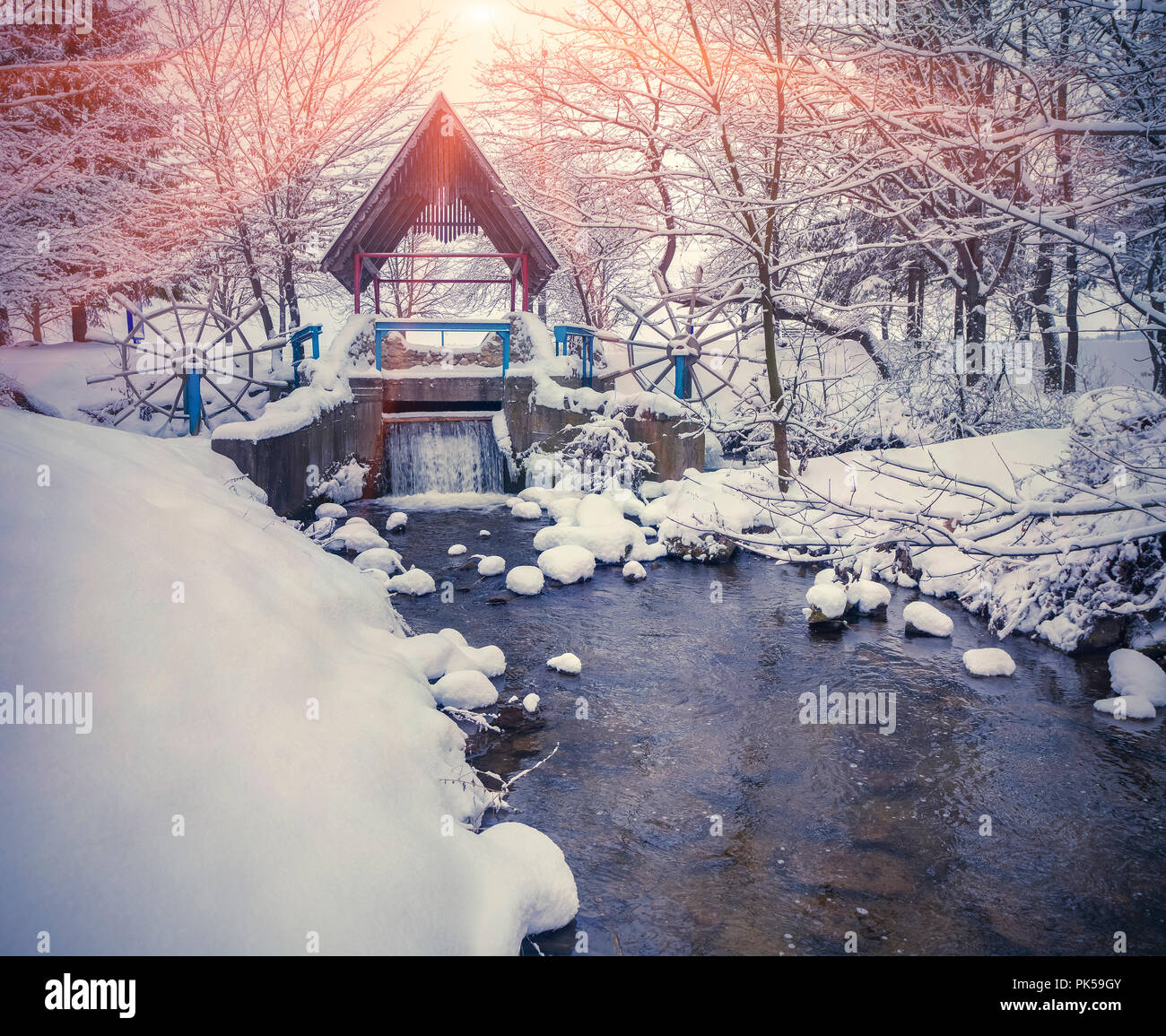 Colorful winter sunset in the city park. Happy New Year! Instagram toning. Stock Photo