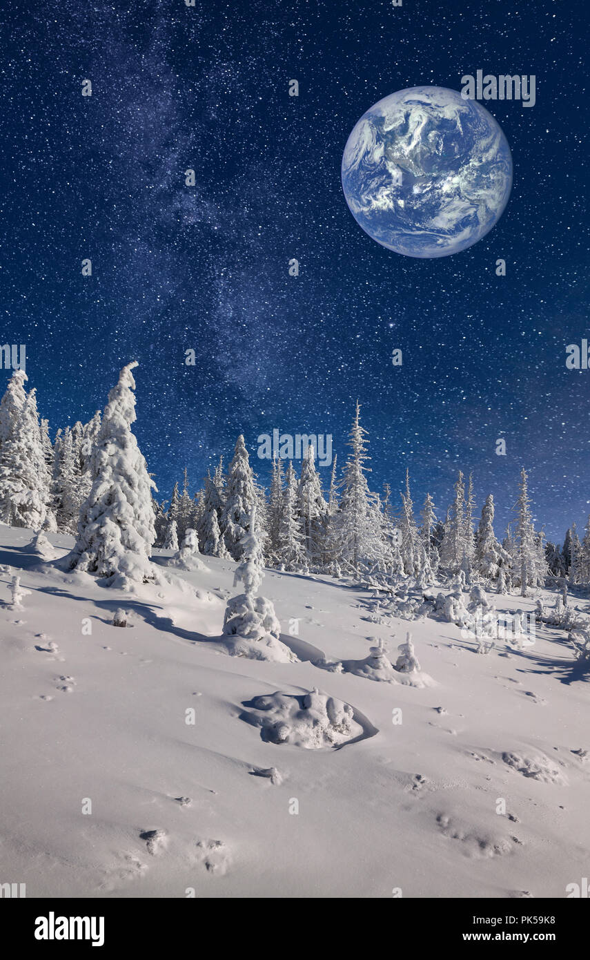 Imaginary view of big blue planet in the sky on winter backgroud. Elements of this image furnished by NASA. Stock Photo
