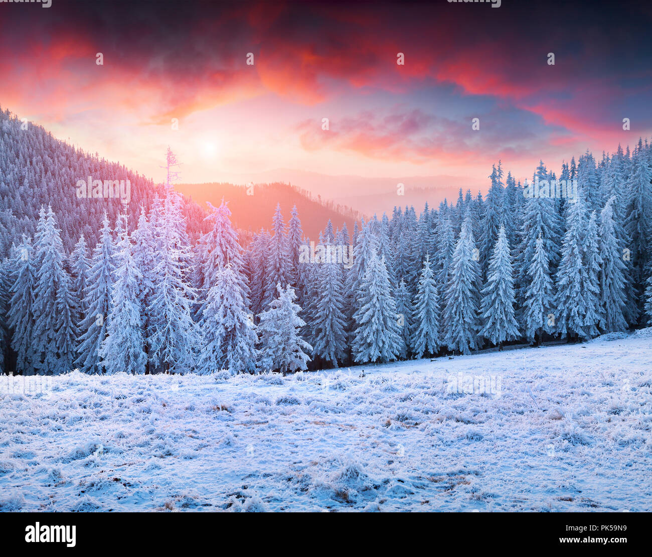 Beautiful winter sunrise in the mountains Stock Photo