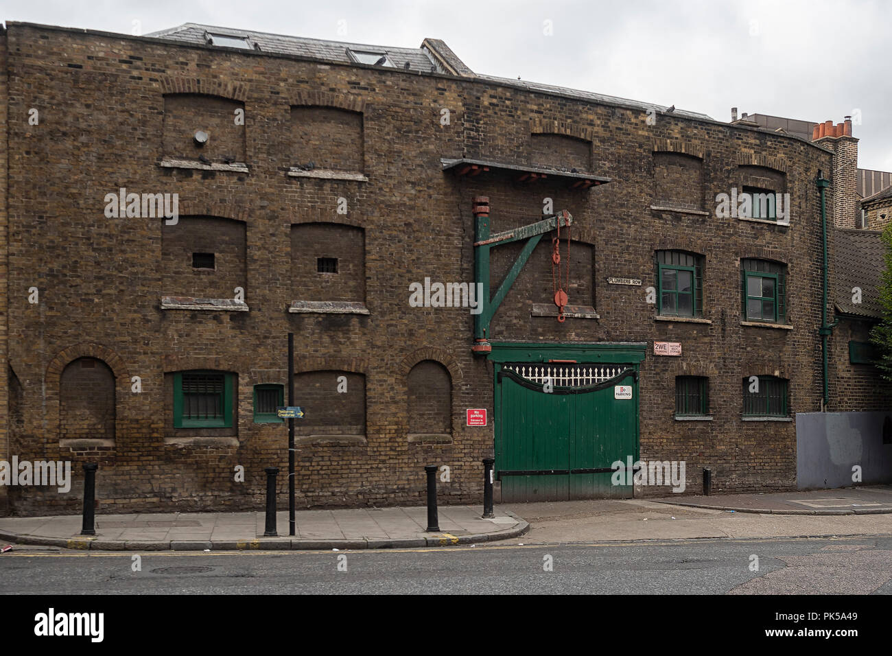 WHITECHAPEL, LONDON Victorian Warehouse on Plumbers Row with gates and