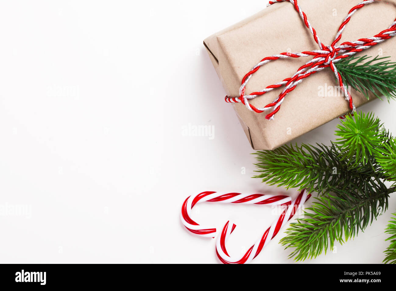 Christmas vintage gift with candy and tree on white background Stock ...