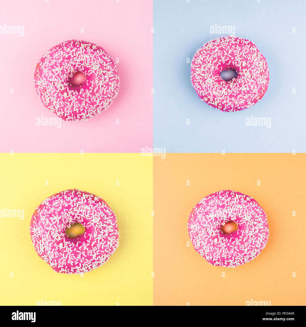 Four sweet doughnuts on color background. Fashion minimal Stock Photo