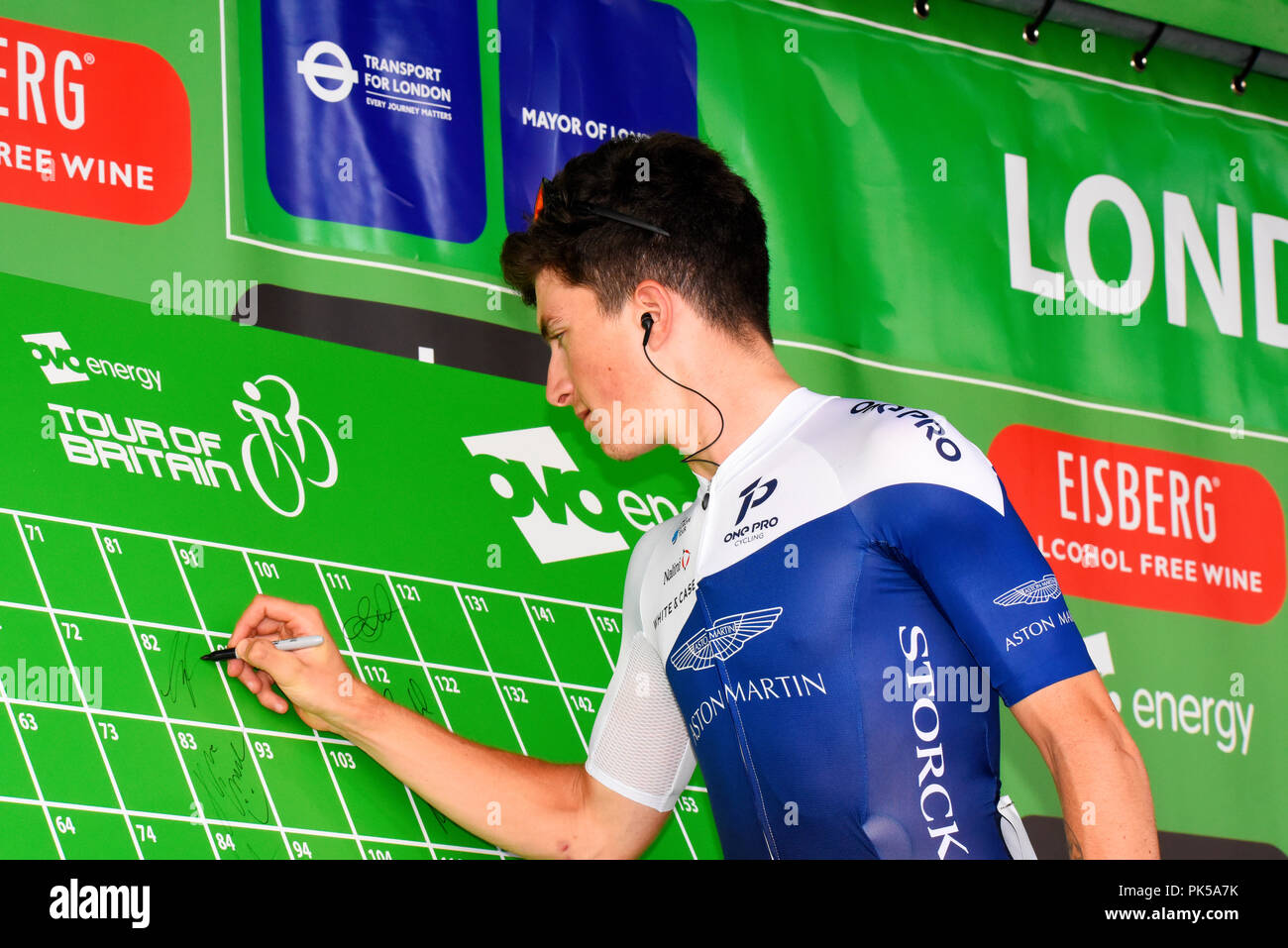 Thomas Baylis of One Pro Cycling signing in at the OVO Energy Tour of Britain cycle race, Stage 8, London, UK Stock Photo